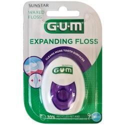 Verpackung von Zahnseide mit der Aufschrift "Expanding Floss" und einem grünen GUM-Logo.